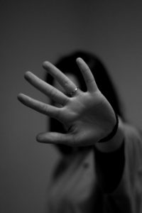 woman hand grey background dramatic crime